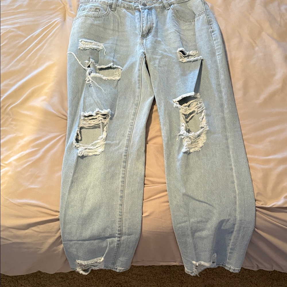 Distressed Light Blue Jeans